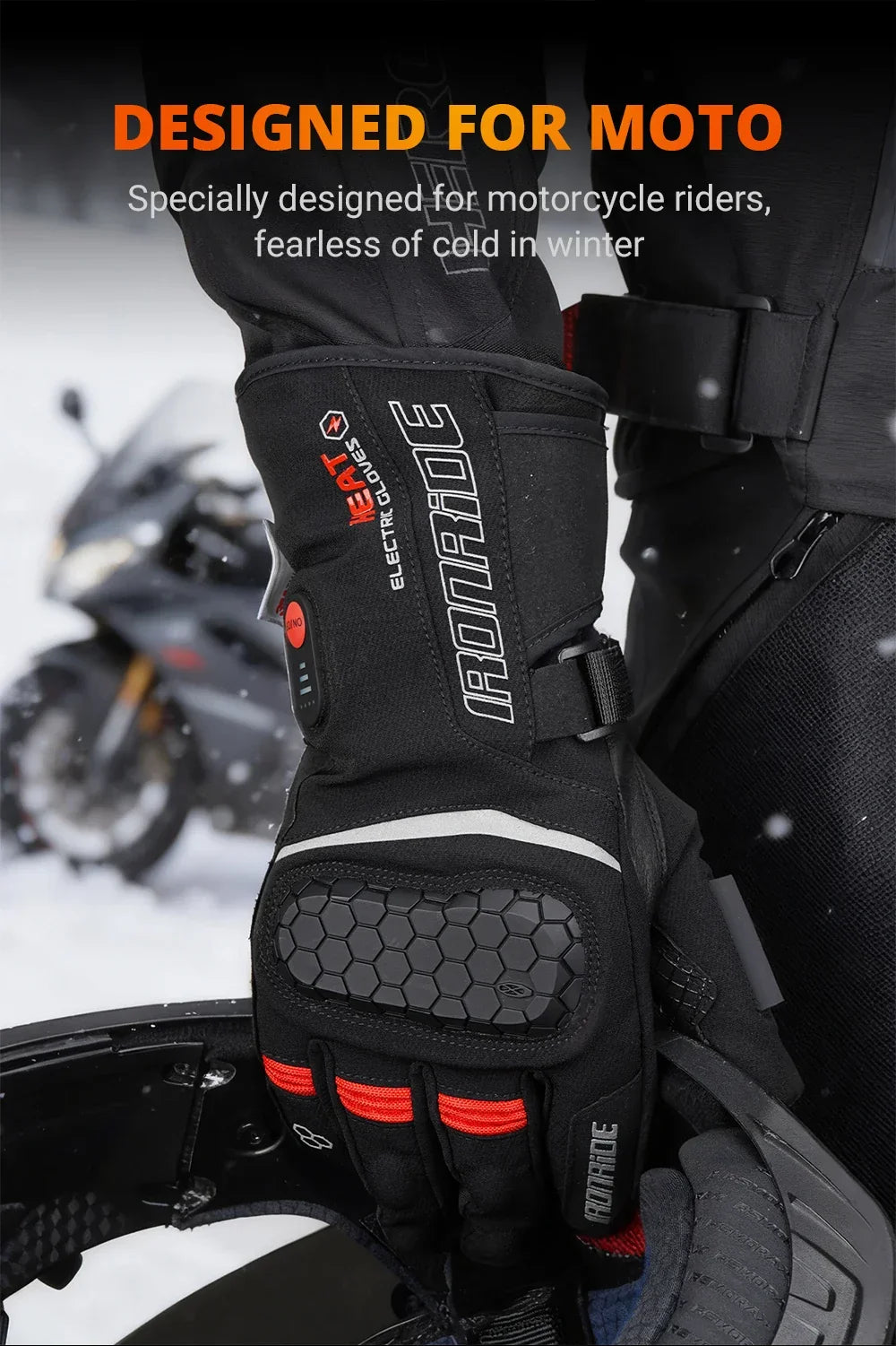 Winter heated motorcycle gloves with protective knuckle design, worn in snowy outdoor setting